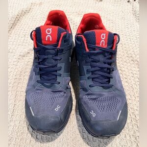 On Running black and Bright Red Shoes